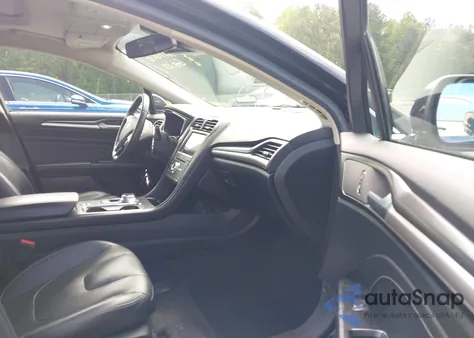 2019 Ford Fusion Hybrid Titanium from USA, damaged, VIN 3FA6P0RU7KR194482